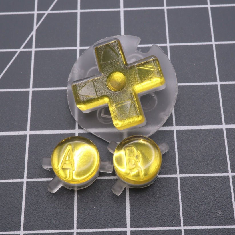 Hand cast custom resin buttons for Nintendo Game Boy Color (GBC CGB) - Chrome gold | Lab Fifteen Co