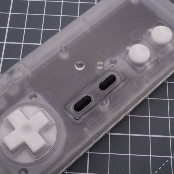 Hand cast custom resin buttons for Nintendo NES controller NES-004 (also fits Game Boy DMG-01) - Glow in the Dark Aqua | Lab Fifteen Co