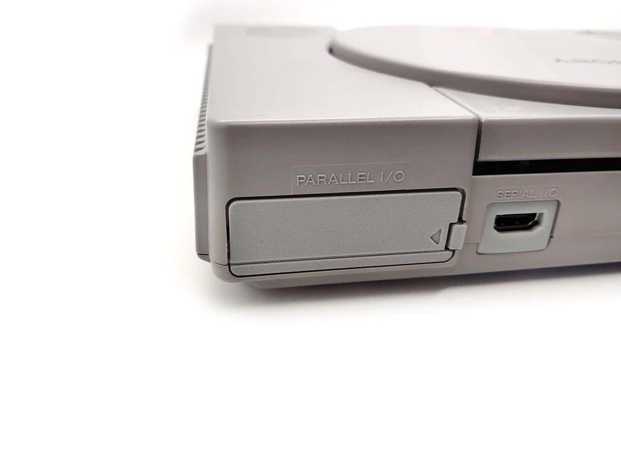 Replacement parallel I/O door cover for Sony PS1 Playstation - Grey | Humble Bazooka - 2