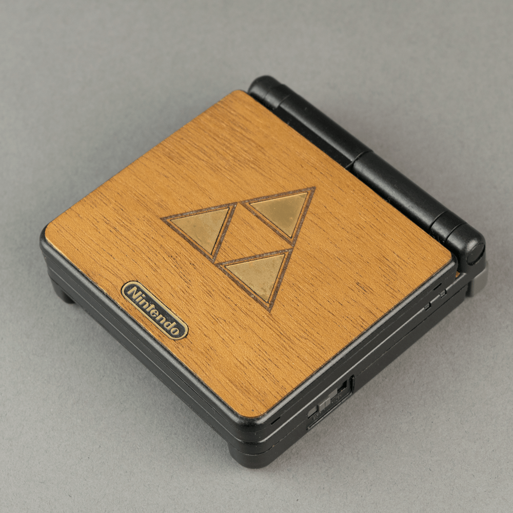 Real wood veneer kit for Nintendo Game Boy Advance SP handheld console - Zelda Triforce Edition self adhesive | Rose Colored Gaming