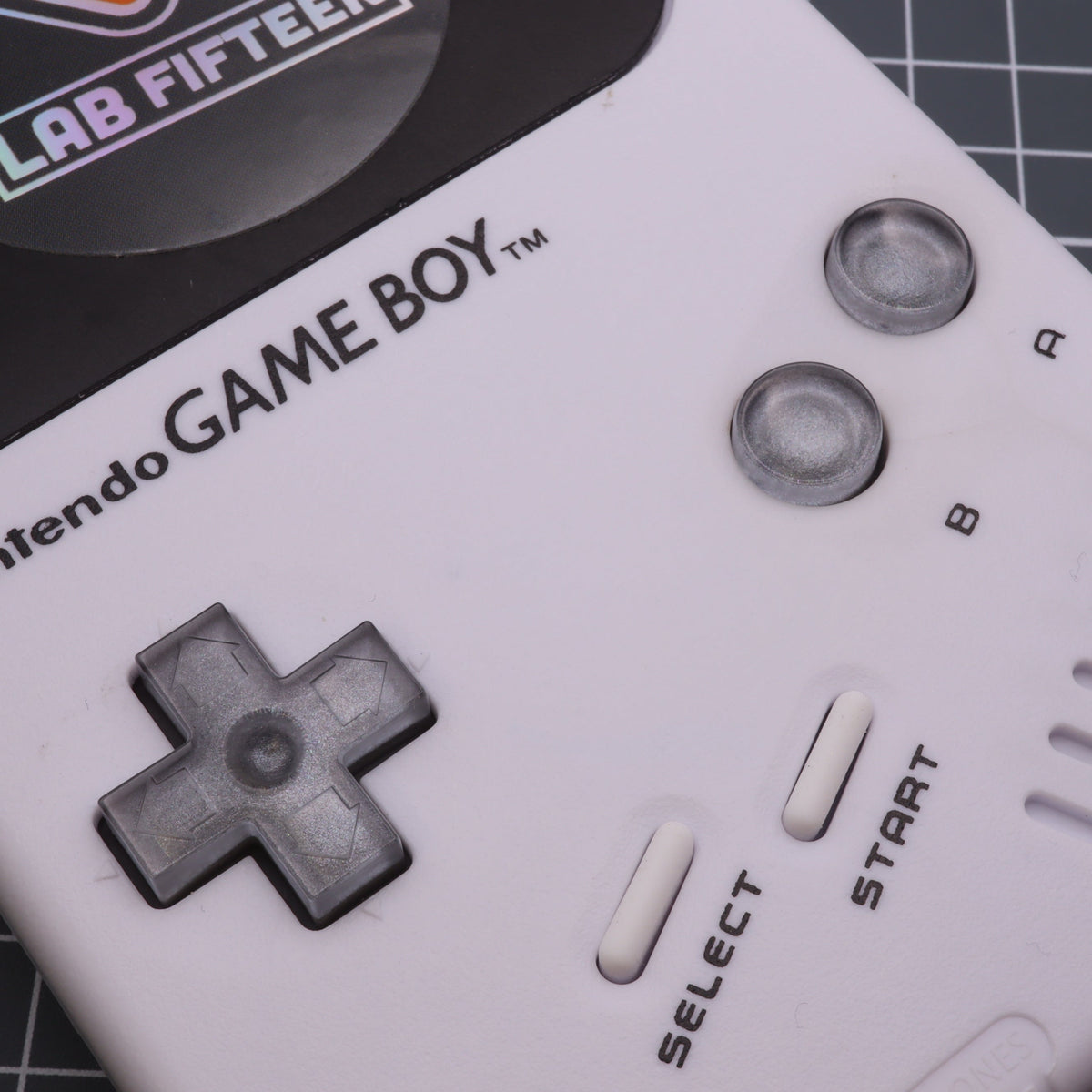 Hand cast custom resin buttons for Nintendo NES controller NES-004 (also fits Game Boy DMG-01) - Metallic Silver | Lab Fifteen Co