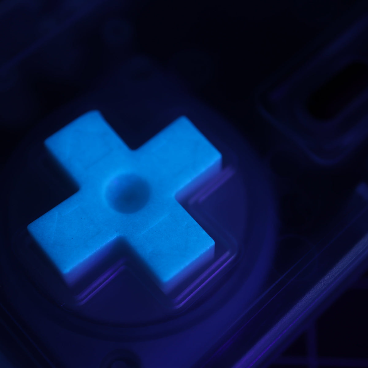 Hand cast custom resin buttons for Nintendo NES controller NES-004 (also fits Game Boy DMG-01) - Glow in the Dark Blue | Lab Fifteen Co