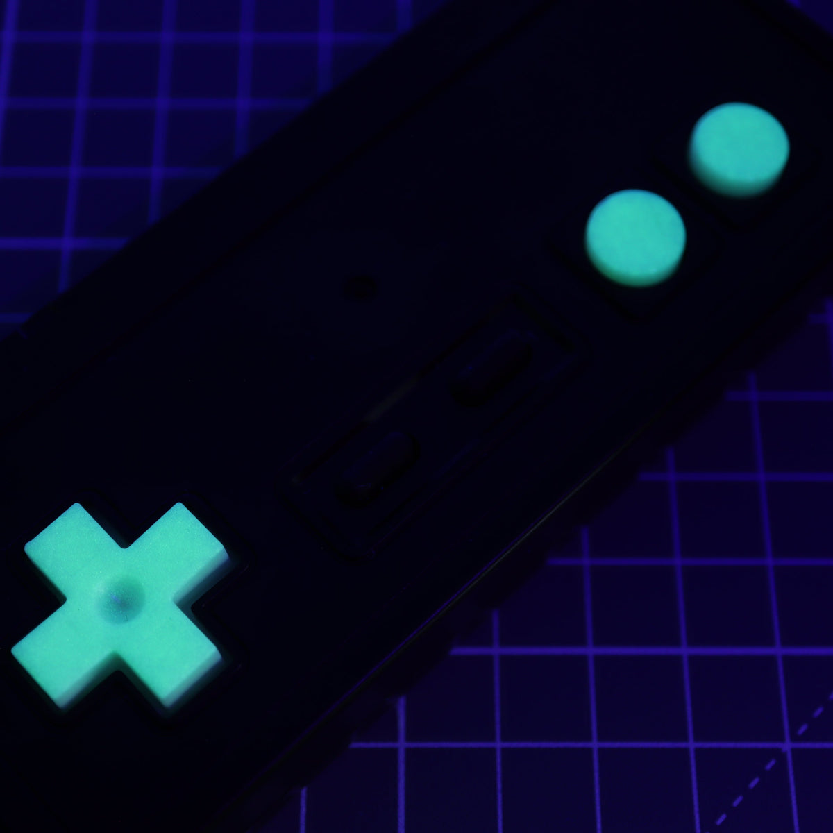 Hand cast custom resin buttons for Nintendo NES controller NES-004 (also fits Game Boy DMG-01) - Glow in the Dark Green | Lab Fifteen Co