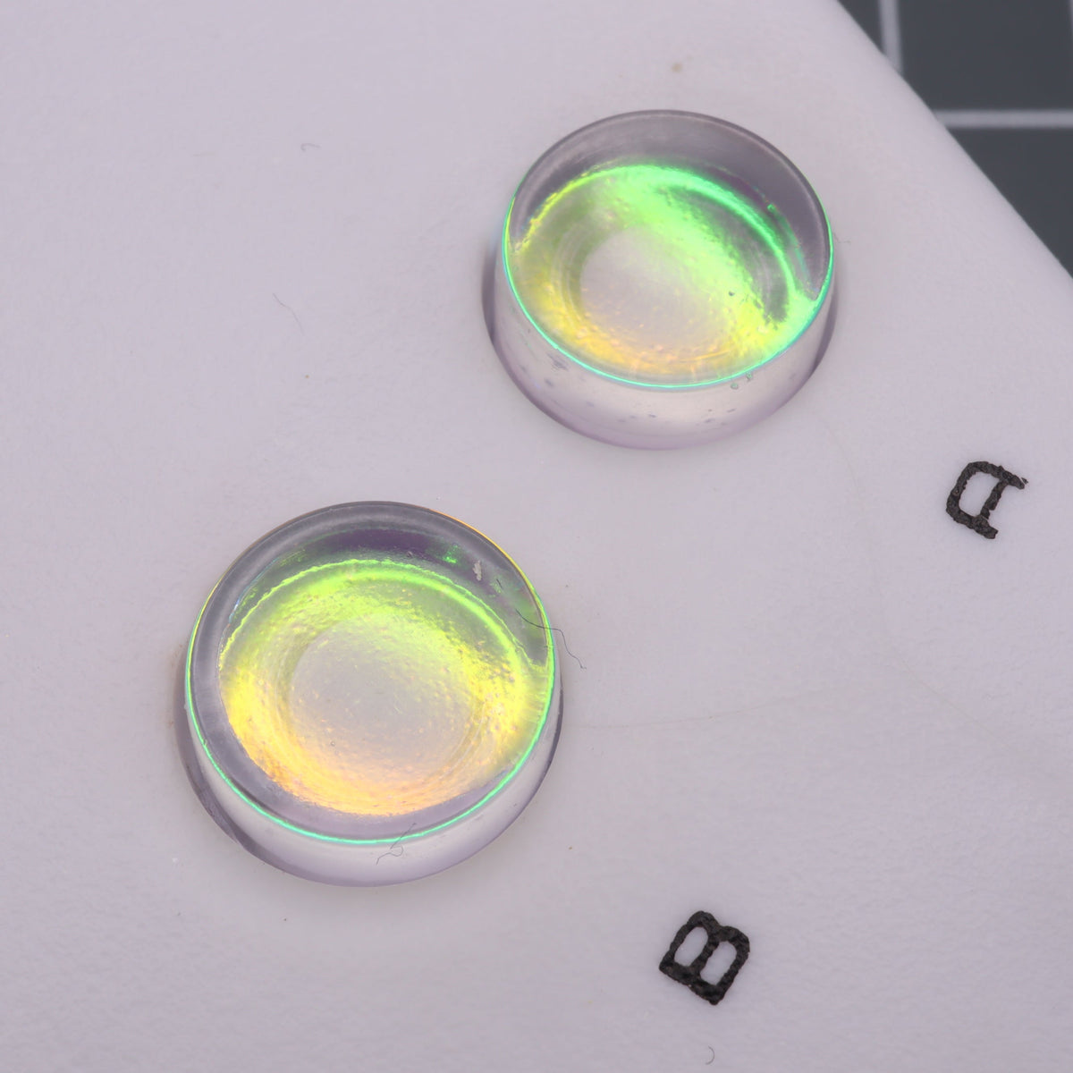 Hand cast custom resin buttons for Nintendo NES controller NES-004 (also fits Game Boy DMG-01) - Sunset Opal | Lab Fifteen Co