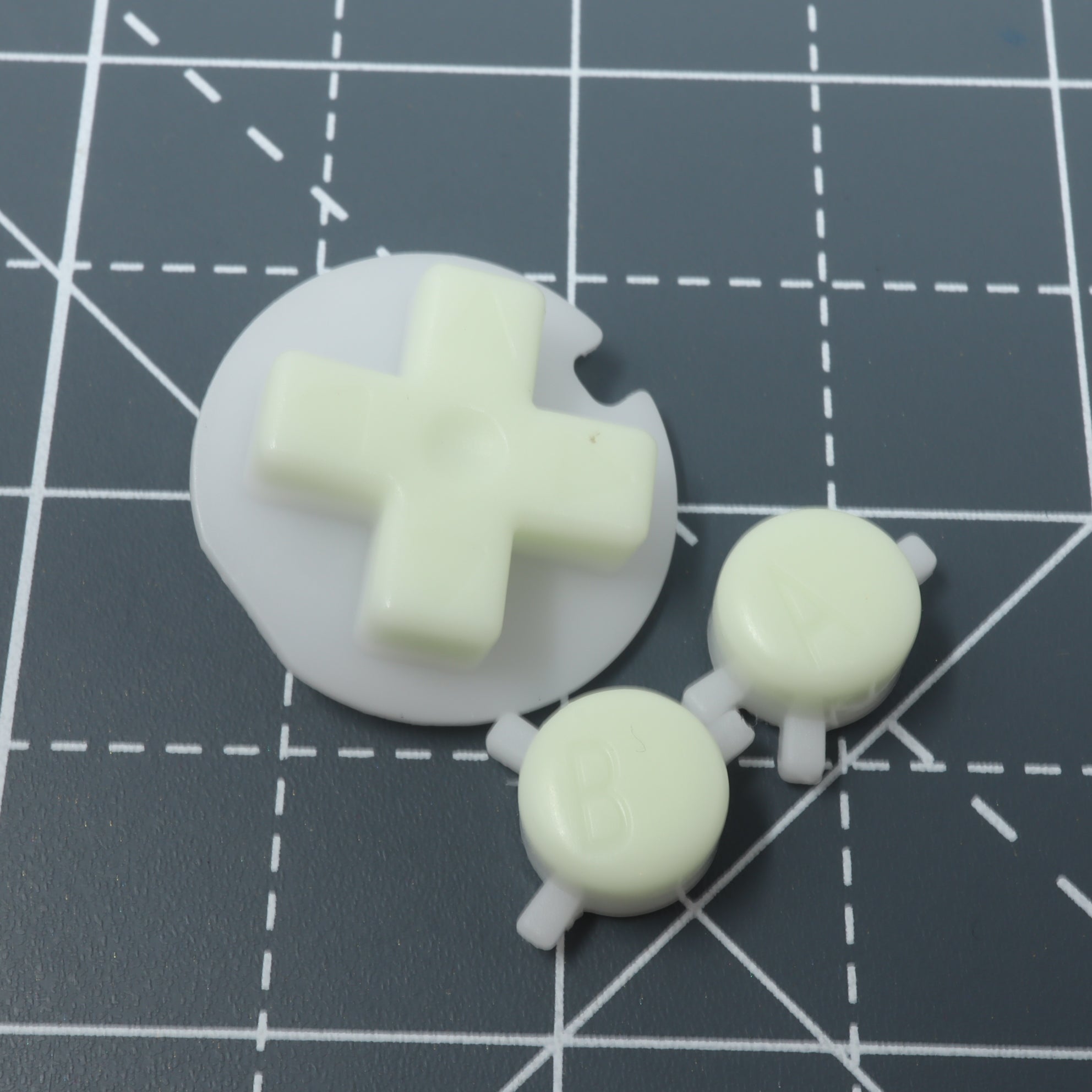 Hand cast custom resin buttons for Nintendo Game Boy Pocket MGB-001 GBP - Glow in the dark green | Lab Fifteen Co