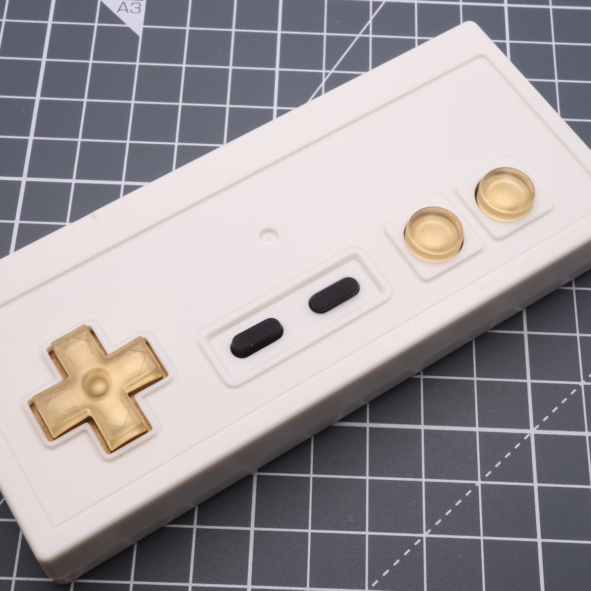 Hand cast custom resin buttons for Nintendo NES controller NES-004 (also fits Game Boy DMG-01) - Metallic Gold | Lab Fifteen Co