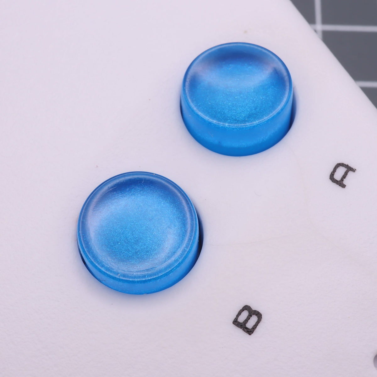 Hand cast custom resin buttons for Nintendo NES controller NES-004 (also fits Game Boy DMG-01) - Blueberry Candy | Lab Fifteen Co