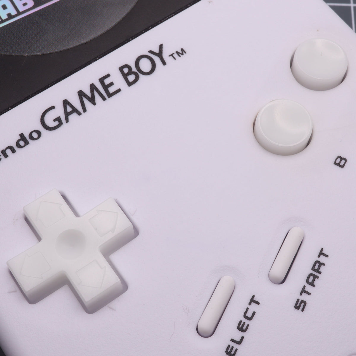 Hand cast custom resin buttons for Nintendo NES controller NES-004 (also fits Game Boy DMG-01) - Glow in the Dark Aqua | Lab Fifteen Co