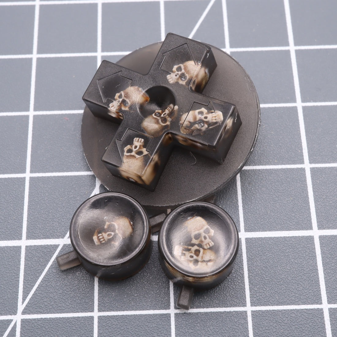 Hand cast custom resin buttons for Nintendo NES controller NES-004 (also fits Game Boy DMG-01) - Skull | Lab Fifteen Co