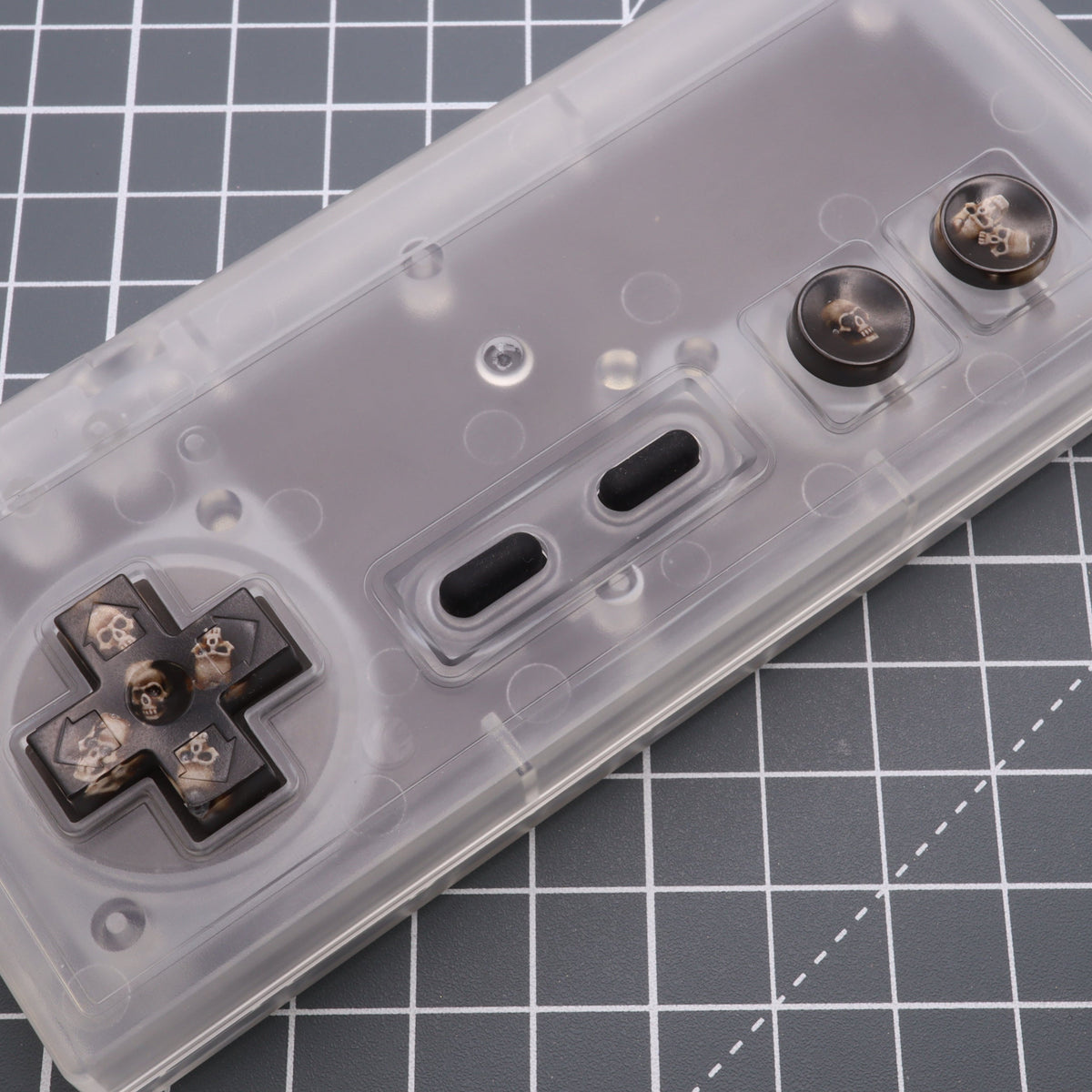 Hand cast custom resin buttons for Nintendo NES controller NES-004 (also fits Game Boy DMG-01) - Skull | Lab Fifteen Co
