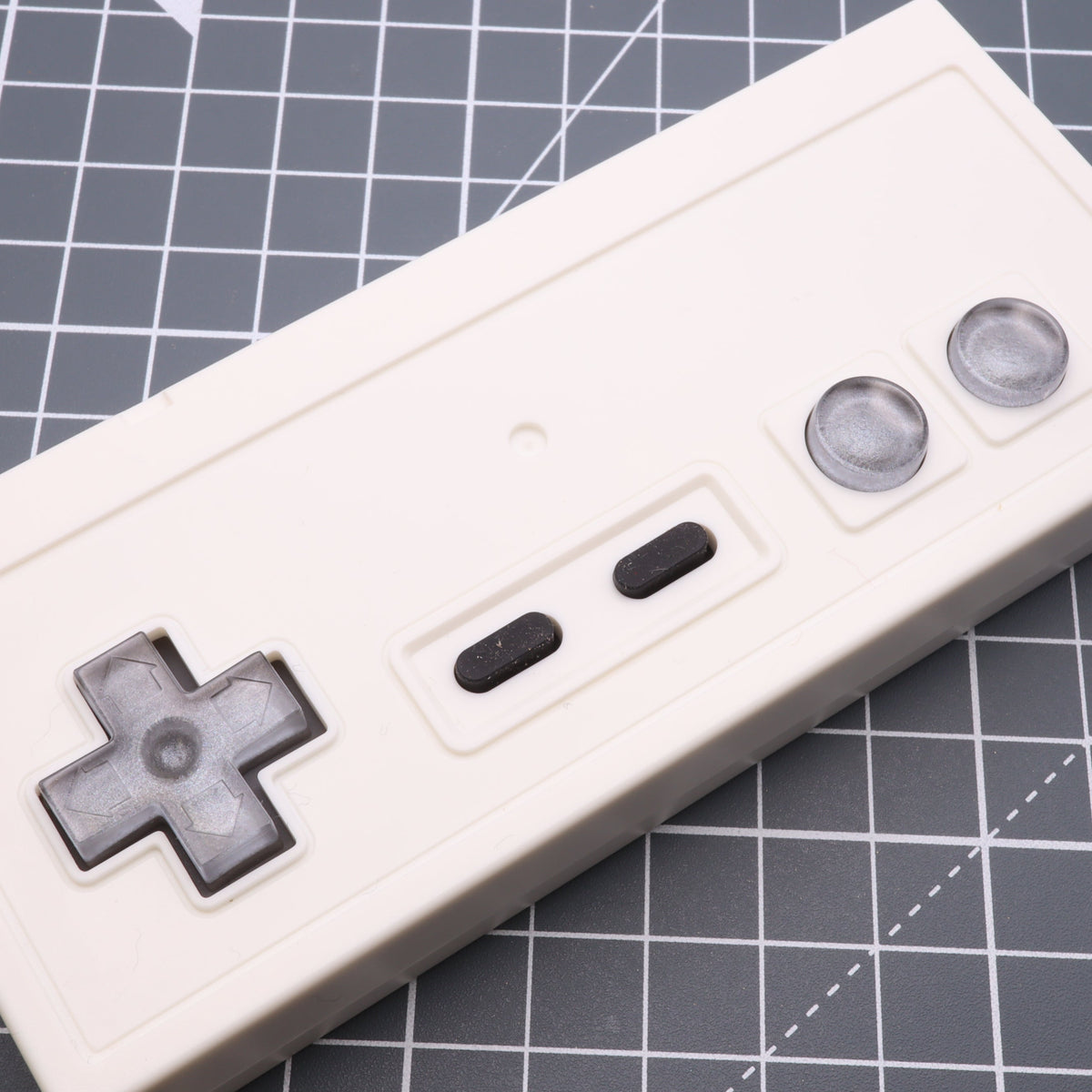 Hand cast custom resin buttons for Nintendo NES controller NES-004 (also fits Game Boy DMG-01) - Metallic Silver | Lab Fifteen Co
