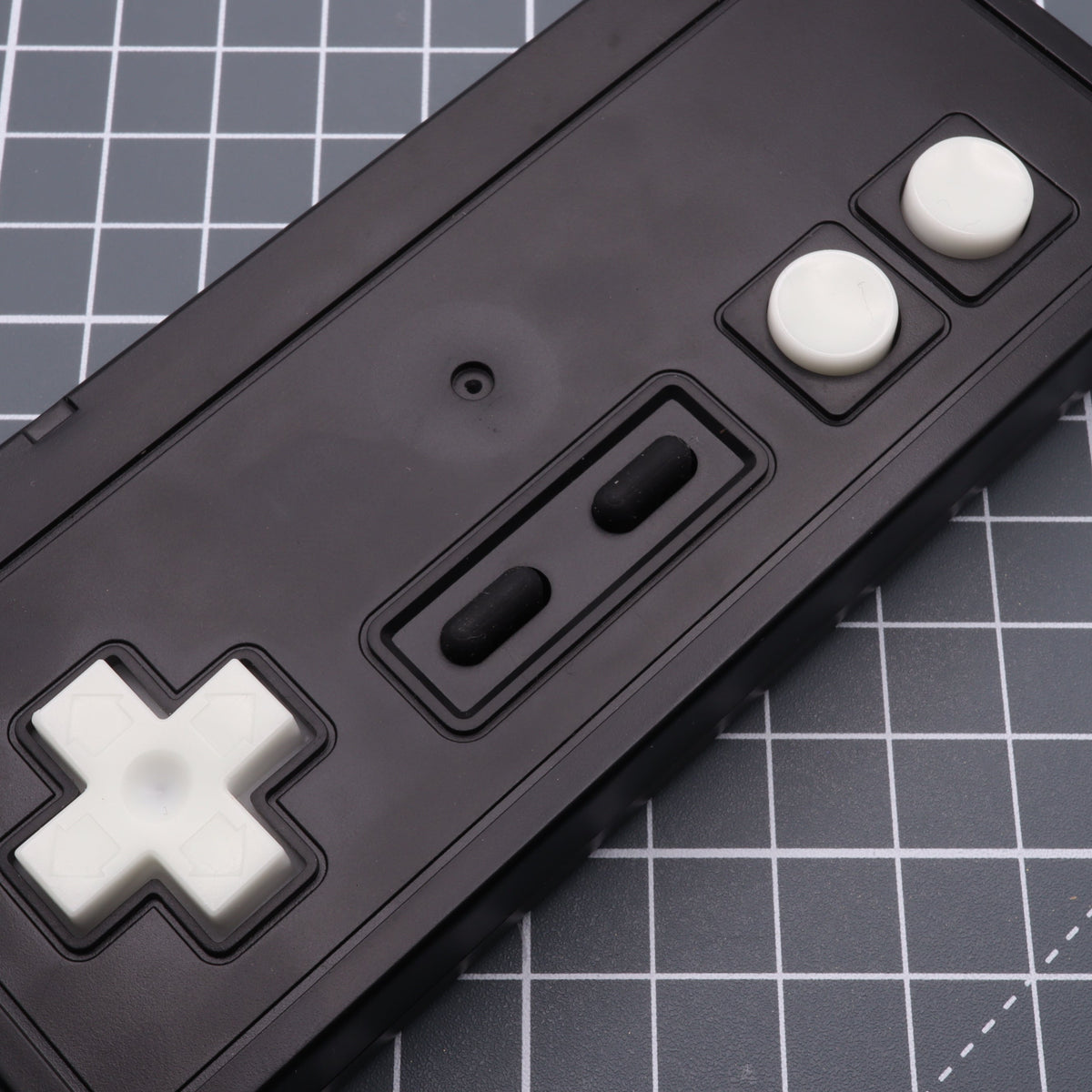 Hand cast custom resin buttons for Nintendo NES controller NES-004 (also fits Game Boy DMG-01) - Glow in the Dark Green | Lab Fifteen Co