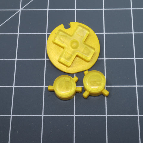 Hand cast custom resin buttons for Nintendo Game Boy Color - Candy Lemon | Lab Fifteen Co