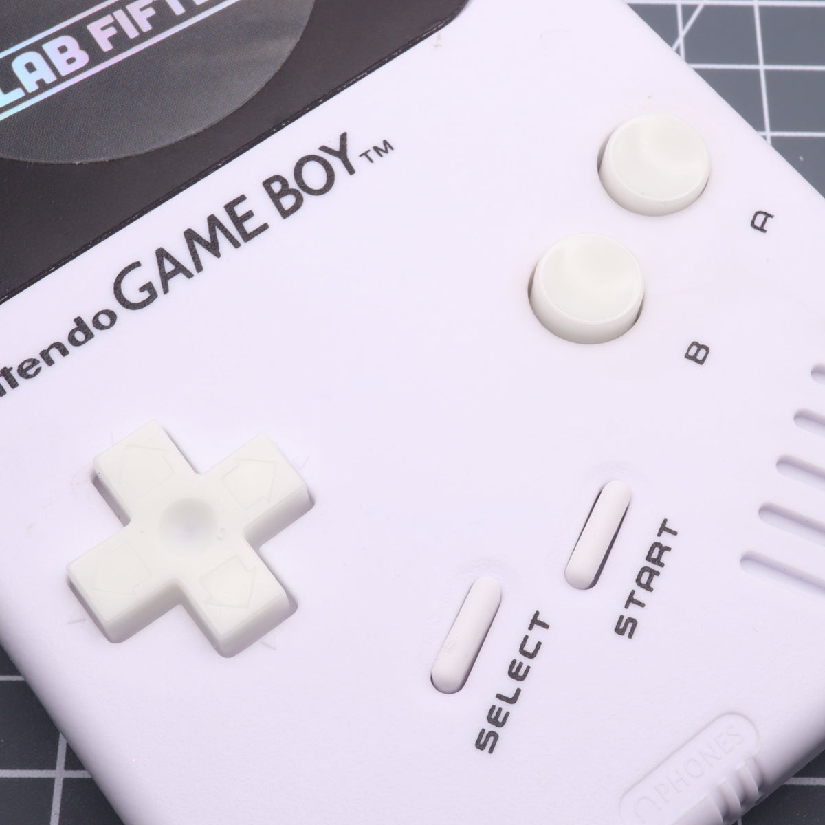 Hand cast custom resin buttons for Nintendo NES controller NES-004 (also fits Game Boy DMG-01) - Glow in the Dark Green | Lab Fifteen Co