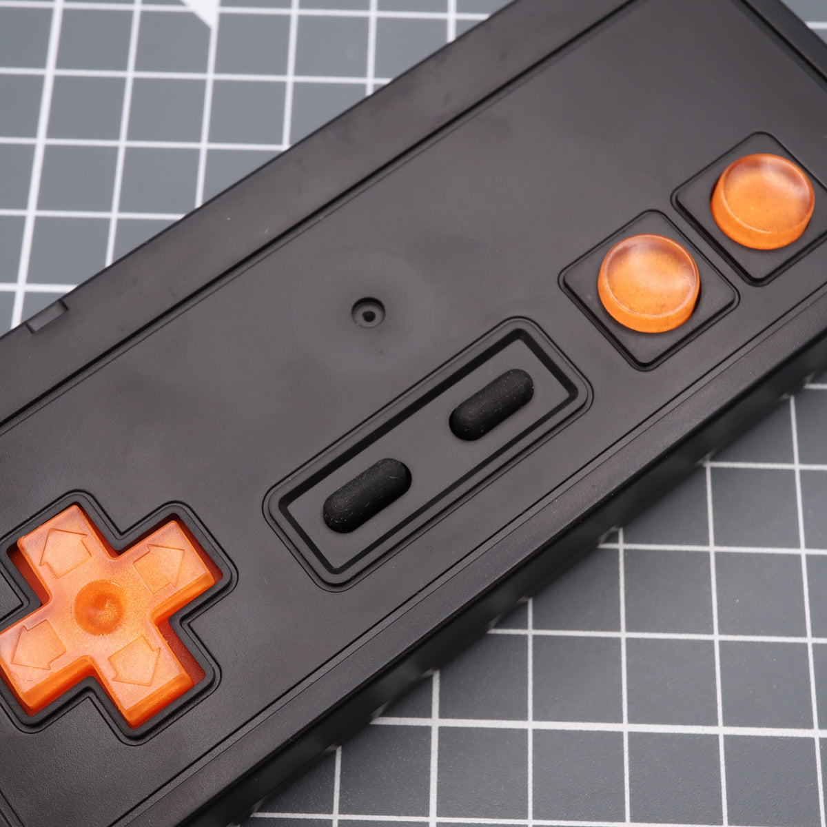 Hand cast custom resin buttons for Nintendo NES controller NES-004 (also fits Game Boy DMG-01) - Orange Candy | Lab Fifteen Co