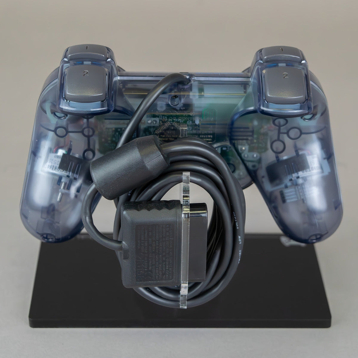 Ps2 Crystal Display stand for Sony PS2 controller - Crystal Black | Rose Colored Gaming