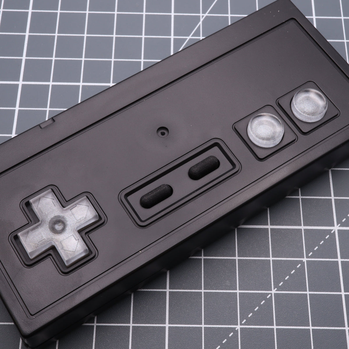 Hand cast custom resin buttons for Nintendo NES controller NES-004 (also fits Game Boy DMG-01) - Metallic Silver | Lab Fifteen Co