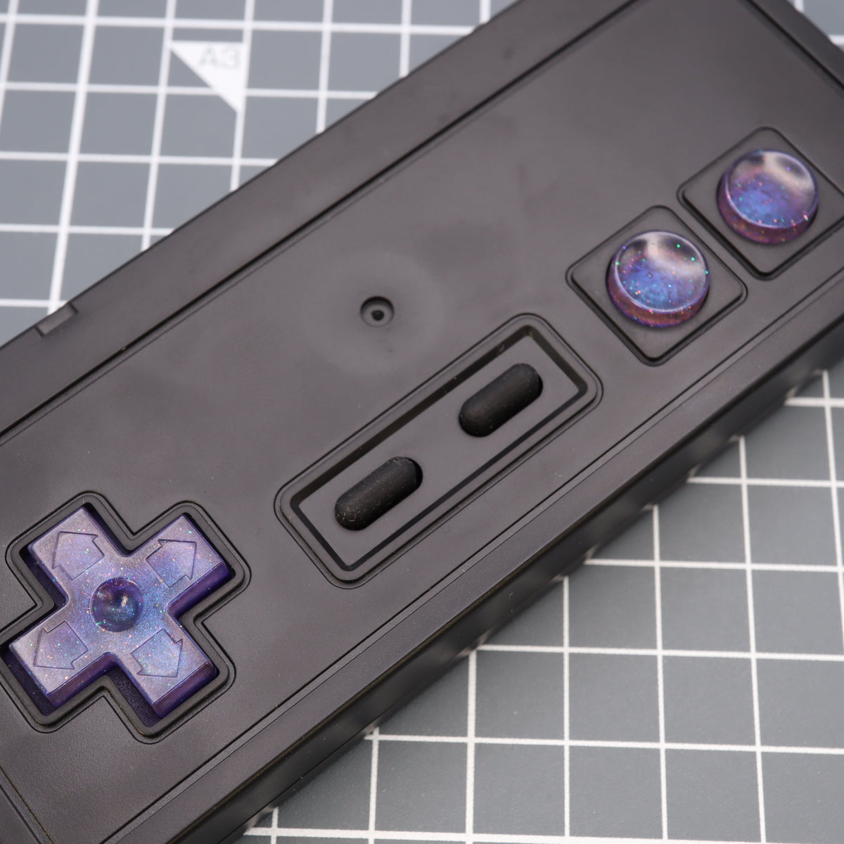 Hand cast custom resin buttons for Nintendo NES controller NES-004 (also fits Game Boy DMG-01) - Cosmic Purple | Lab Fifteen Co