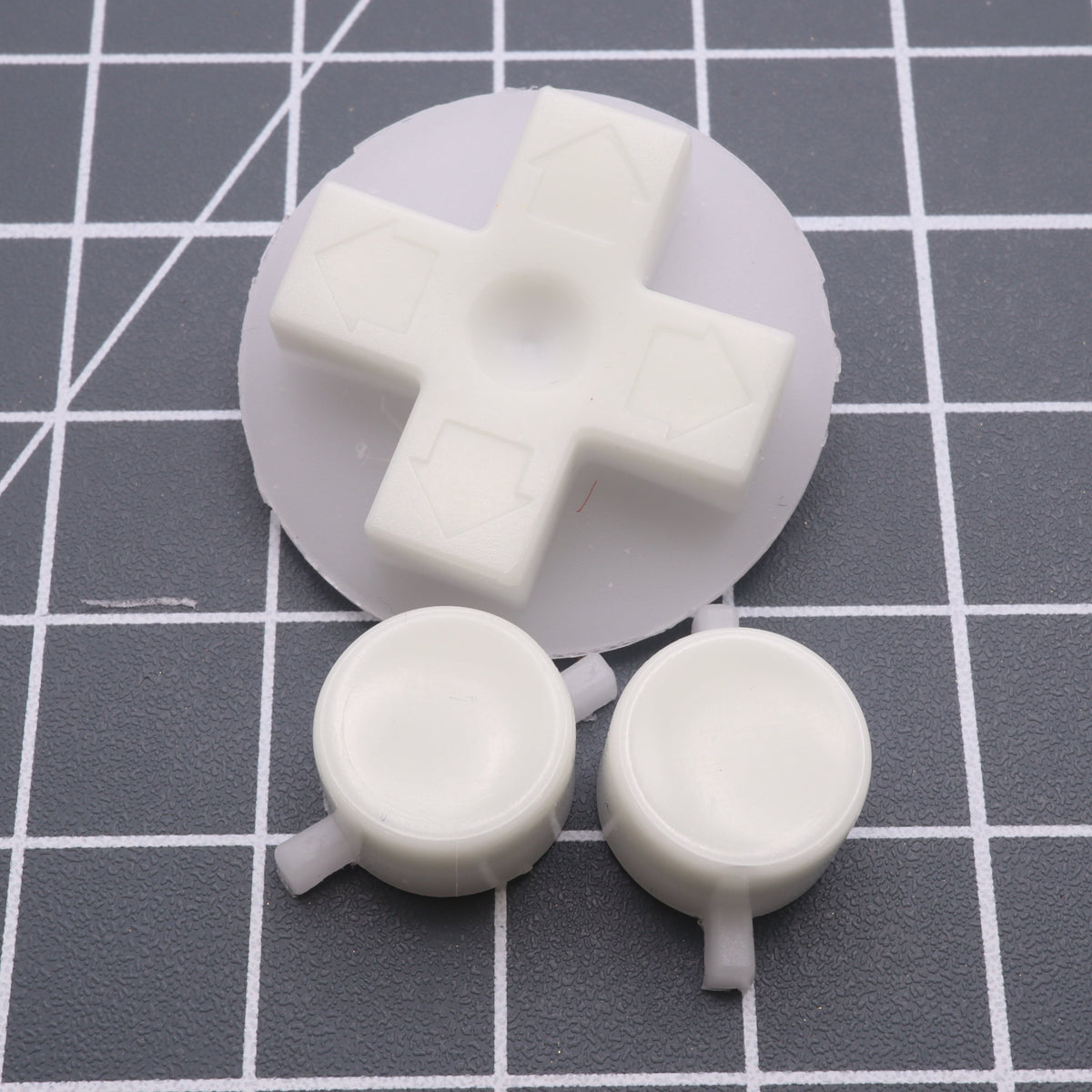 Hand cast custom resin buttons for Nintendo NES controller NES-004 (also fits Game Boy DMG-01) - Glow in the Dark Green | Lab Fifteen Co