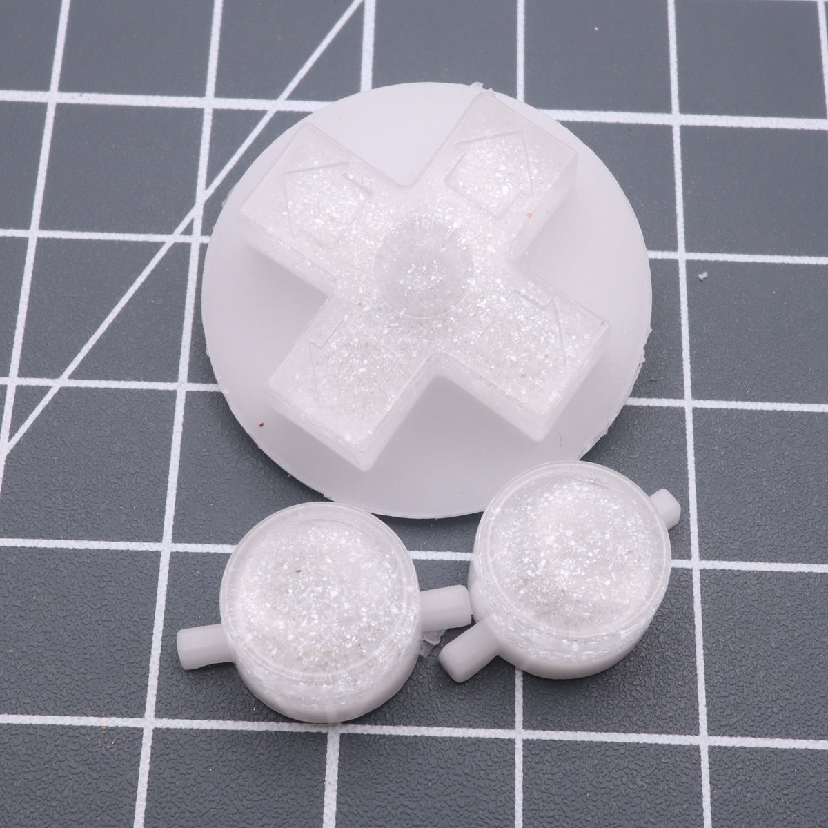 Hand cast custom resin buttons for Nintendo NES controller NES-004 (also fits Game Boy DMG-01) - Pearl White | Lab Fifteen Co