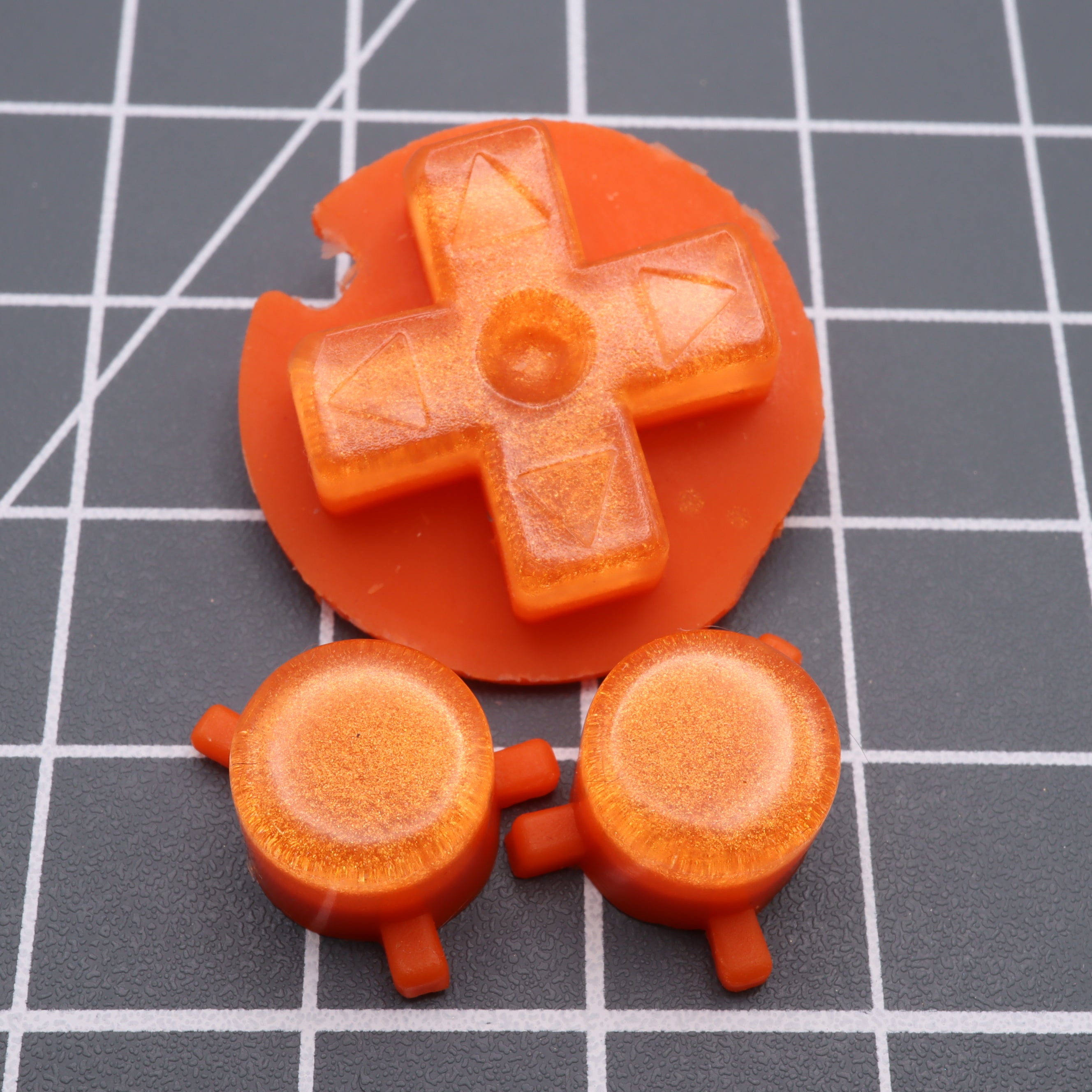 Hand cast custom resin buttons for Nintendo Game Boy Pocket MGB-001 GBP - Orange Candy | Lab Fifteen Co