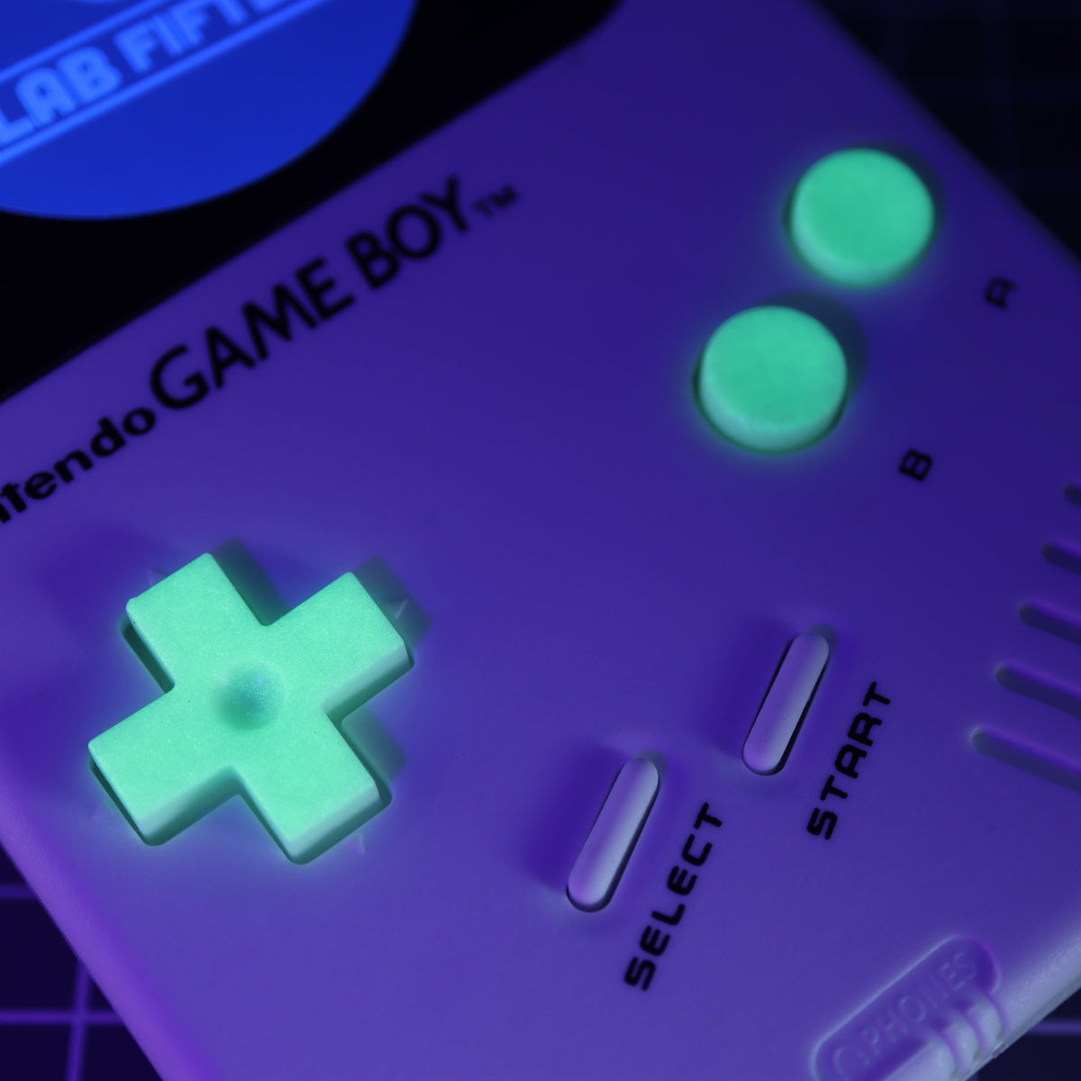 Hand cast custom resin buttons for Nintendo NES controller NES-004 (also fits Game Boy DMG-01) - Glow in the Dark Green | Lab Fifteen Co