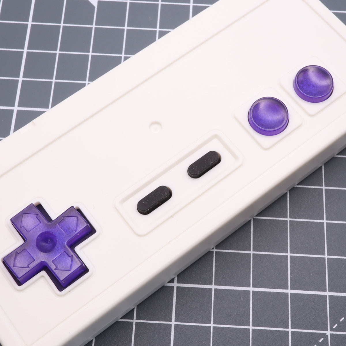 Hand cast custom resin buttons for Nintendo NES controller NES-004 (also fits Game Boy DMG-01) - Grape Candy | Lab Fifteen Co