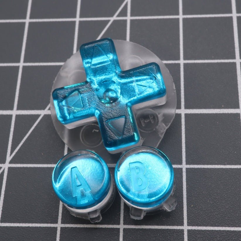 Custom resin buttons for Game Boy Advance - Chrome Blue | Lab Fifteen Co
