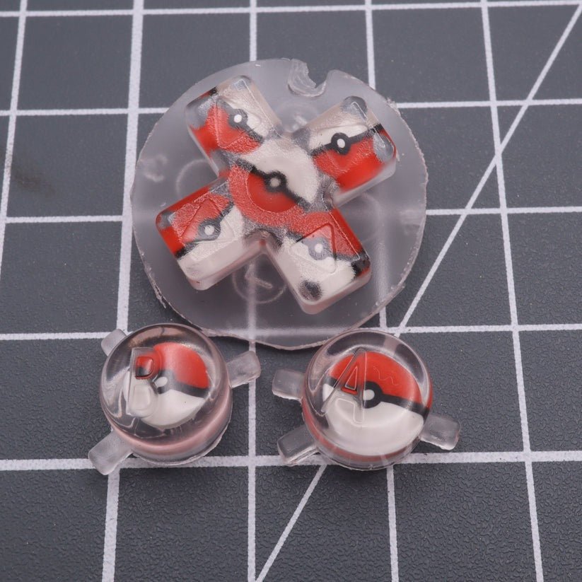 Custom resin buttons for Game Boy Color - Pokeball | Lab Fifteen Co