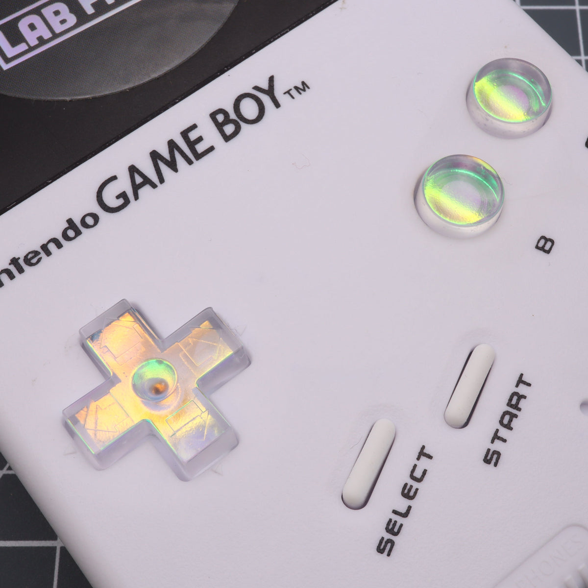 Hand cast custom resin buttons for Nintendo NES controller NES-004 (also fits Game Boy DMG-01) - Sunset Opal | Lab Fifteen Co