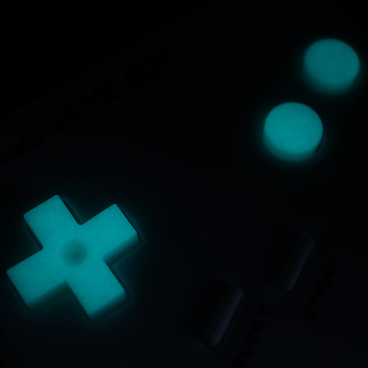 Hand cast custom resin buttons for Nintendo NES controller NES-004 (also fits Game Boy DMG-01) - Glow in the Dark Aqua | Lab Fifteen Co