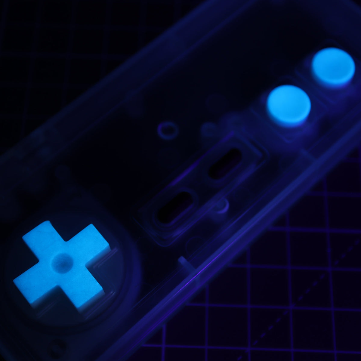 Hand cast custom resin buttons for Nintendo NES controller NES-004 (also fits Game Boy DMG-01) - Glow in the Dark Blue | Lab Fifteen Co