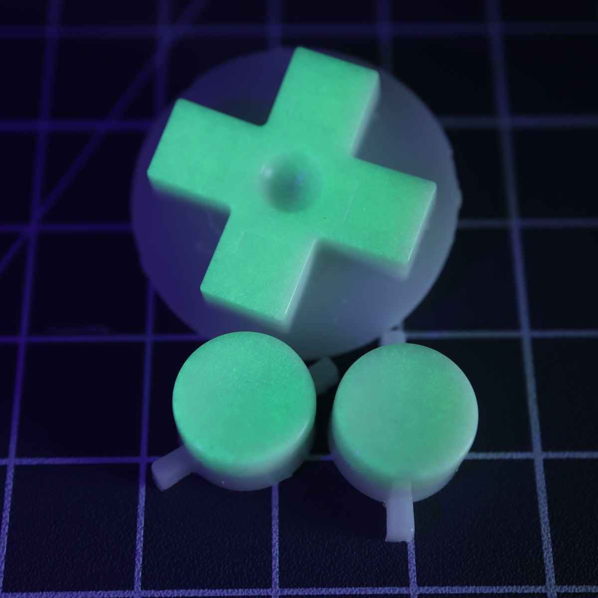 Hand cast custom resin buttons for Nintendo NES controller NES-004 (also fits Game Boy DMG-01) - Glow in the Dark Green | Lab Fifteen Co