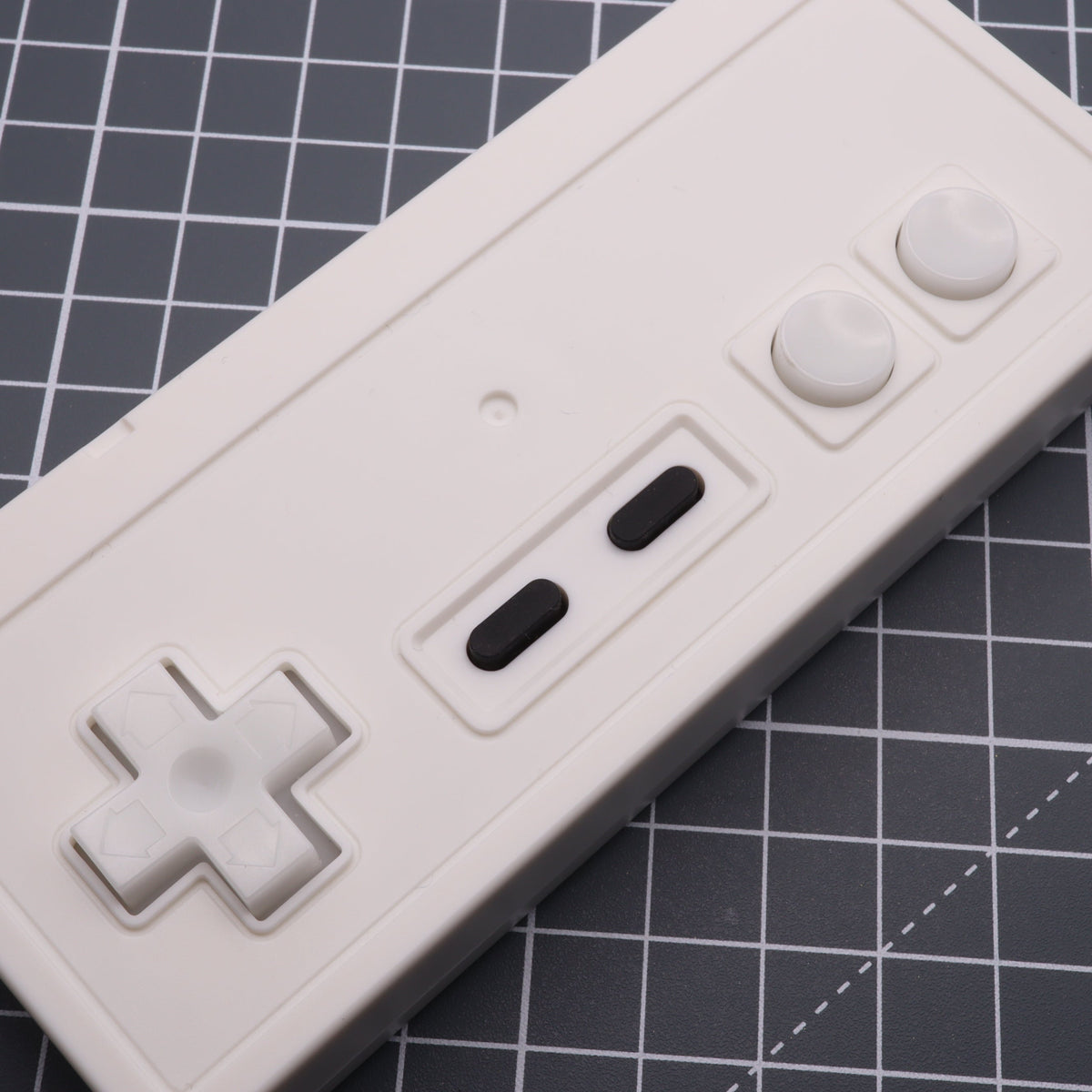 Hand cast custom resin buttons for Nintendo NES controller NES-004 (also fits Game Boy DMG-01) - Glow in the Dark Aqua | Lab Fifteen Co