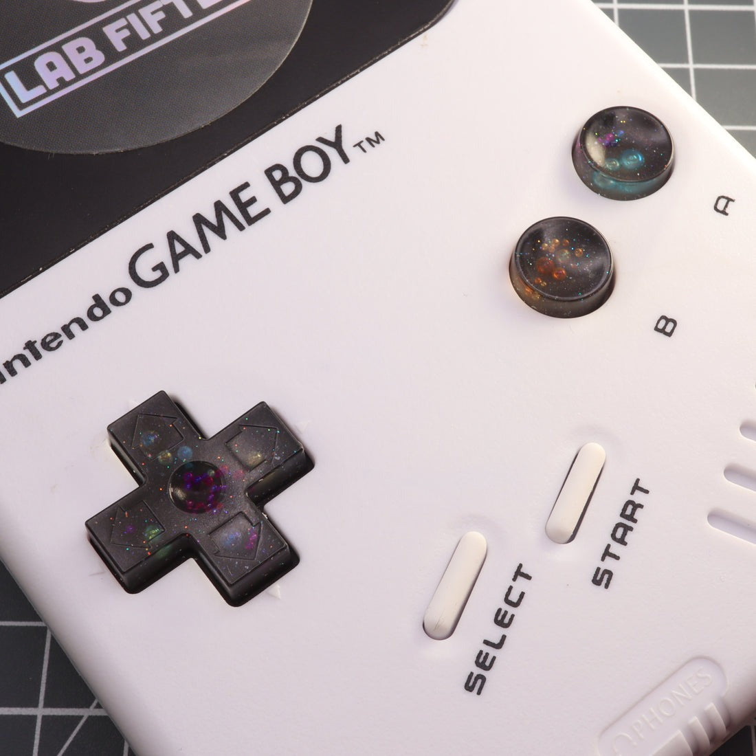 Hand cast custom resin buttons for Nintendo NES controller NES-004 (also fits Game Boy DMG-01) - Solar System | Lab Fifteen Co