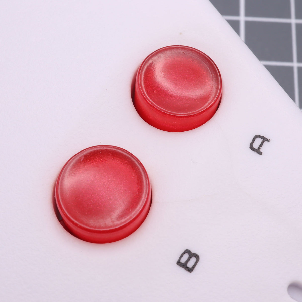 Hand cast custom resin buttons for Nintendo NES controller NES-004 (also fits Game Boy DMG-01) - Strawberry Candy | Lab Fifteen Co