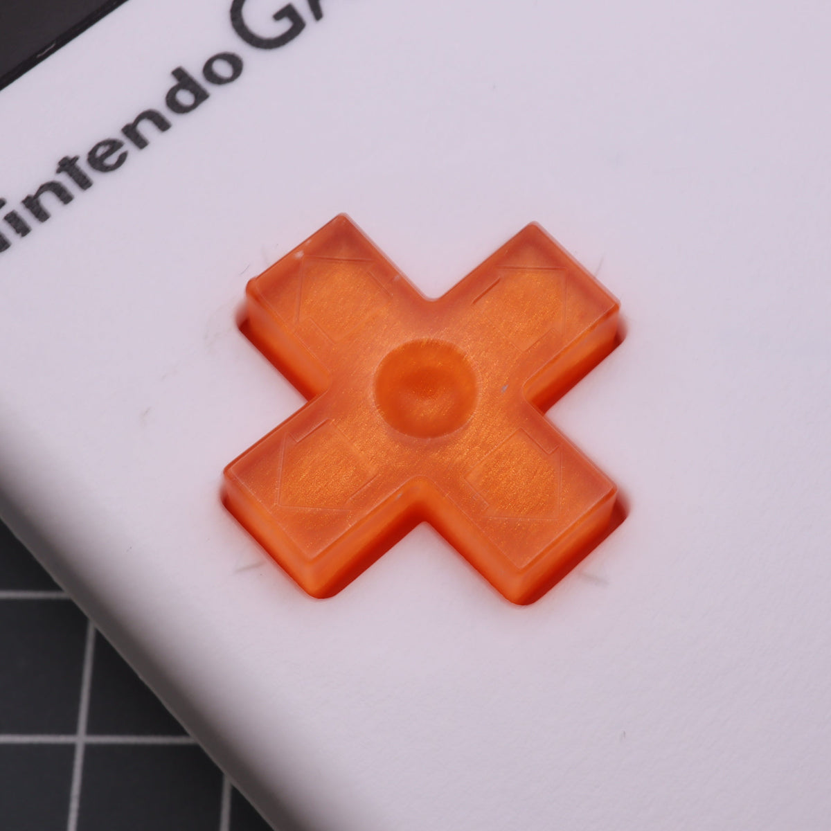 Hand cast custom resin buttons for Nintendo NES controller NES-004 (also fits Game Boy DMG-01) - Orange Candy | Lab Fifteen Co
