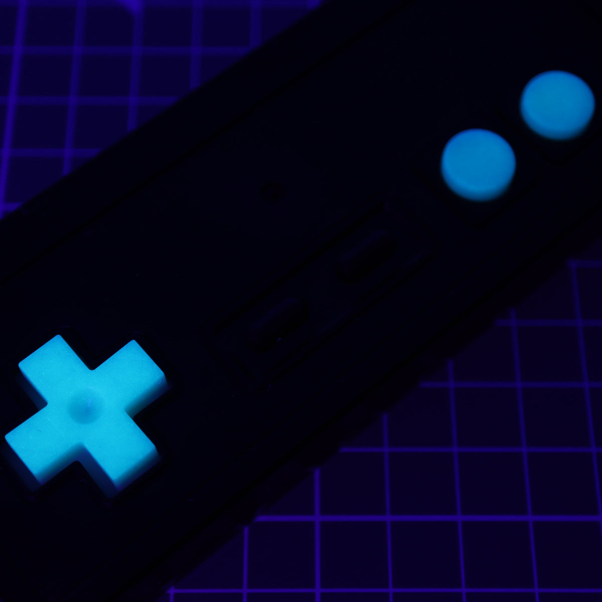 Hand cast custom resin buttons for Nintendo NES controller NES-004 (also fits Game Boy DMG-01) - Glow in the Dark Aqua | Lab Fifteen Co