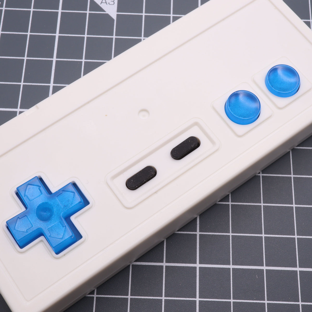 Hand cast custom resin buttons for Nintendo NES controller NES-004 (also fits Game Boy DMG-01) - Blueberry Candy | Lab Fifteen Co