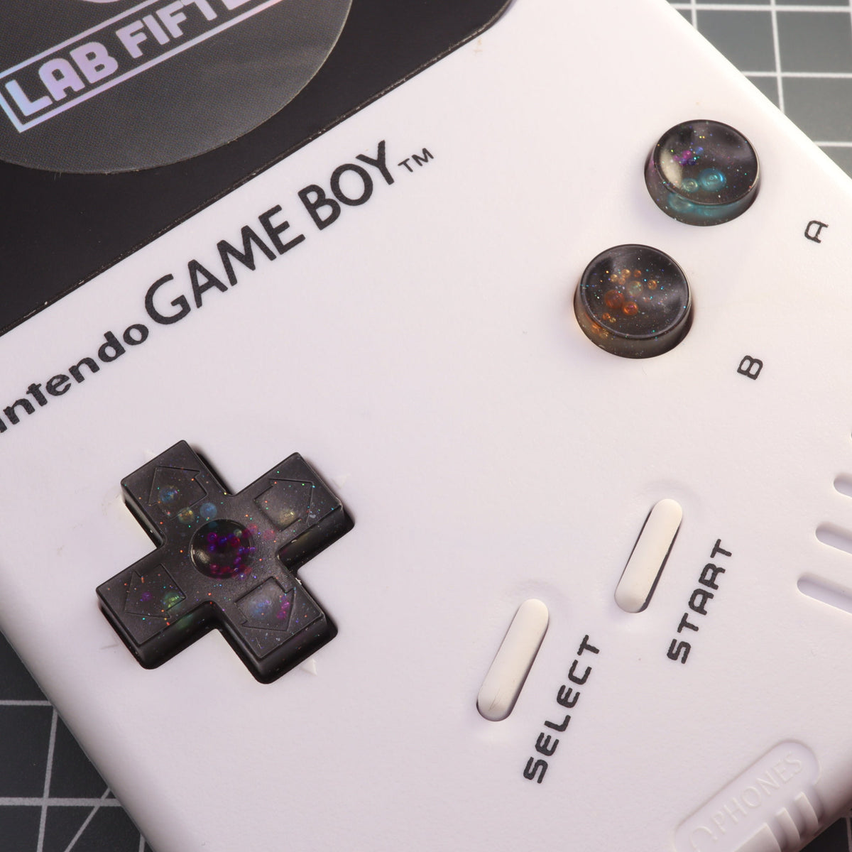 Hand cast custom resin buttons for Nintendo NES controller NES-004 (also fits Game Boy DMG-01) - Solar System | Lab Fifteen Co