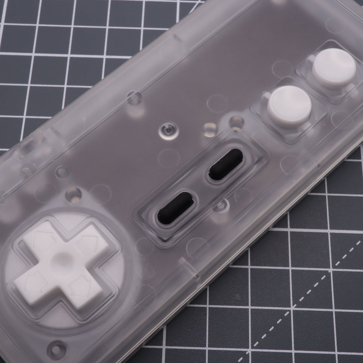 Hand cast custom resin buttons for Nintendo NES controller NES-004 (also fits Game Boy DMG-01) - Glow in the Dark Blue | Lab Fifteen Co