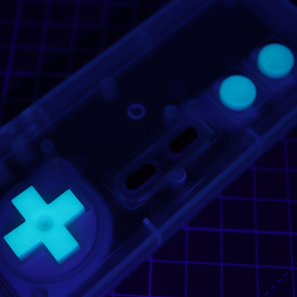 Hand cast custom resin buttons for Nintendo NES controller NES-004 (also fits Game Boy DMG-01) - Glow in the Dark Aqua | Lab Fifteen Co