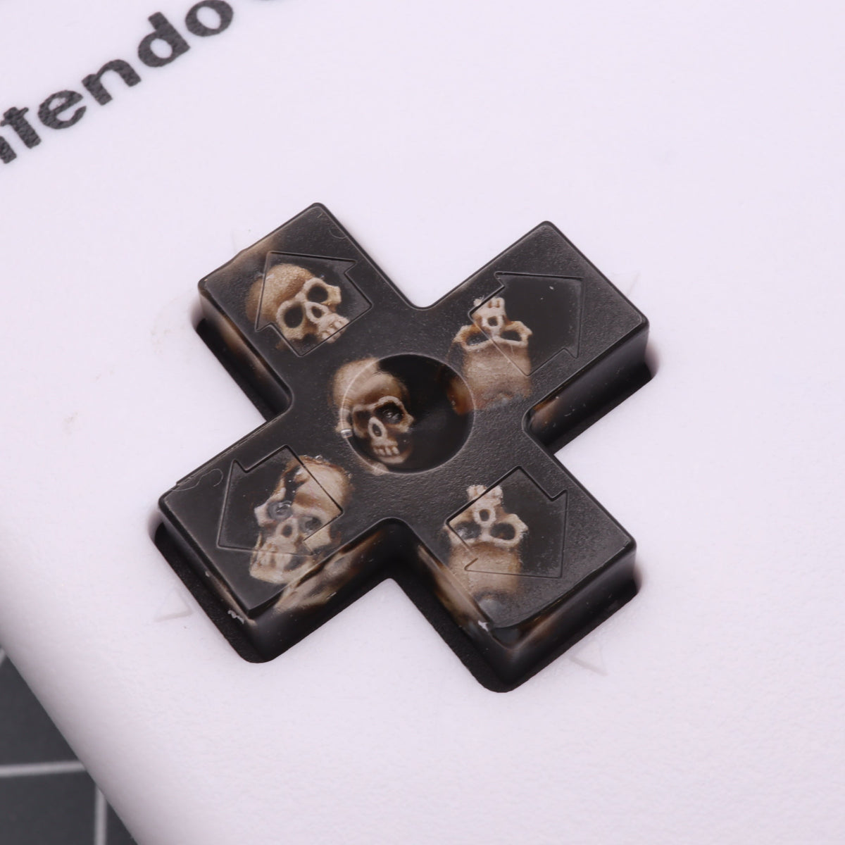 Hand cast custom resin buttons for Nintendo NES controller NES-004 (also fits Game Boy DMG-01) - Skull | Lab Fifteen Co