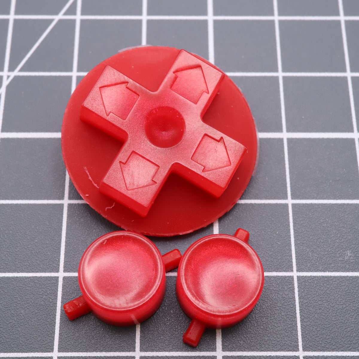 Hand cast custom resin buttons for Nintendo NES controller NES-004 (also fits Game Boy DMG-01) - Strawberry Candy | Lab Fifteen Co