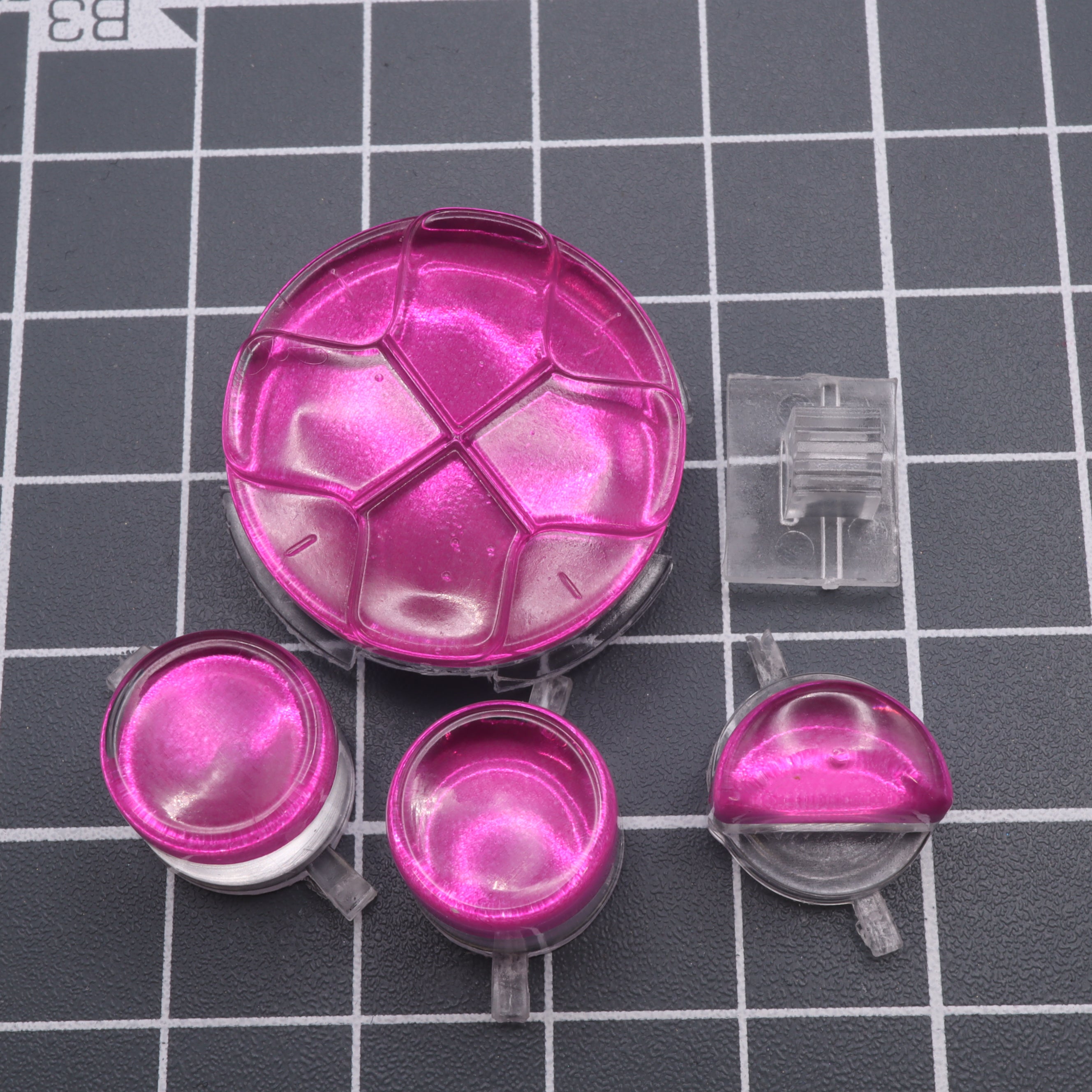 Hand cast custom resin buttons for Sega Game Gear - Chrome pink | Lab Fifteen Co