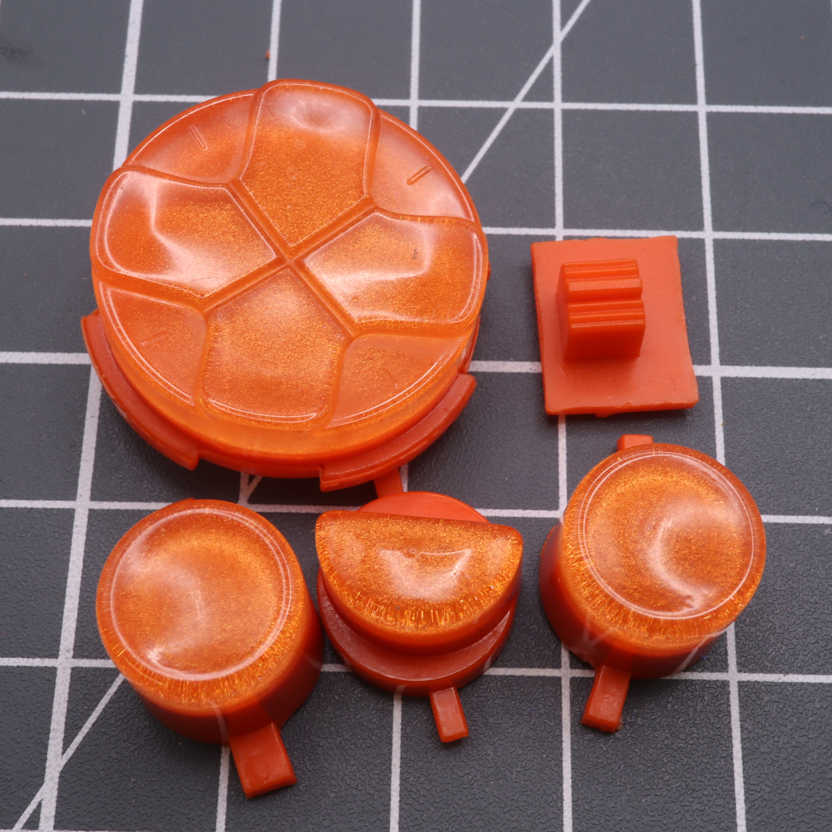 Hand cast custom resin buttons for Sega Game Gear - Orange candy | Lab Fifteen Co
