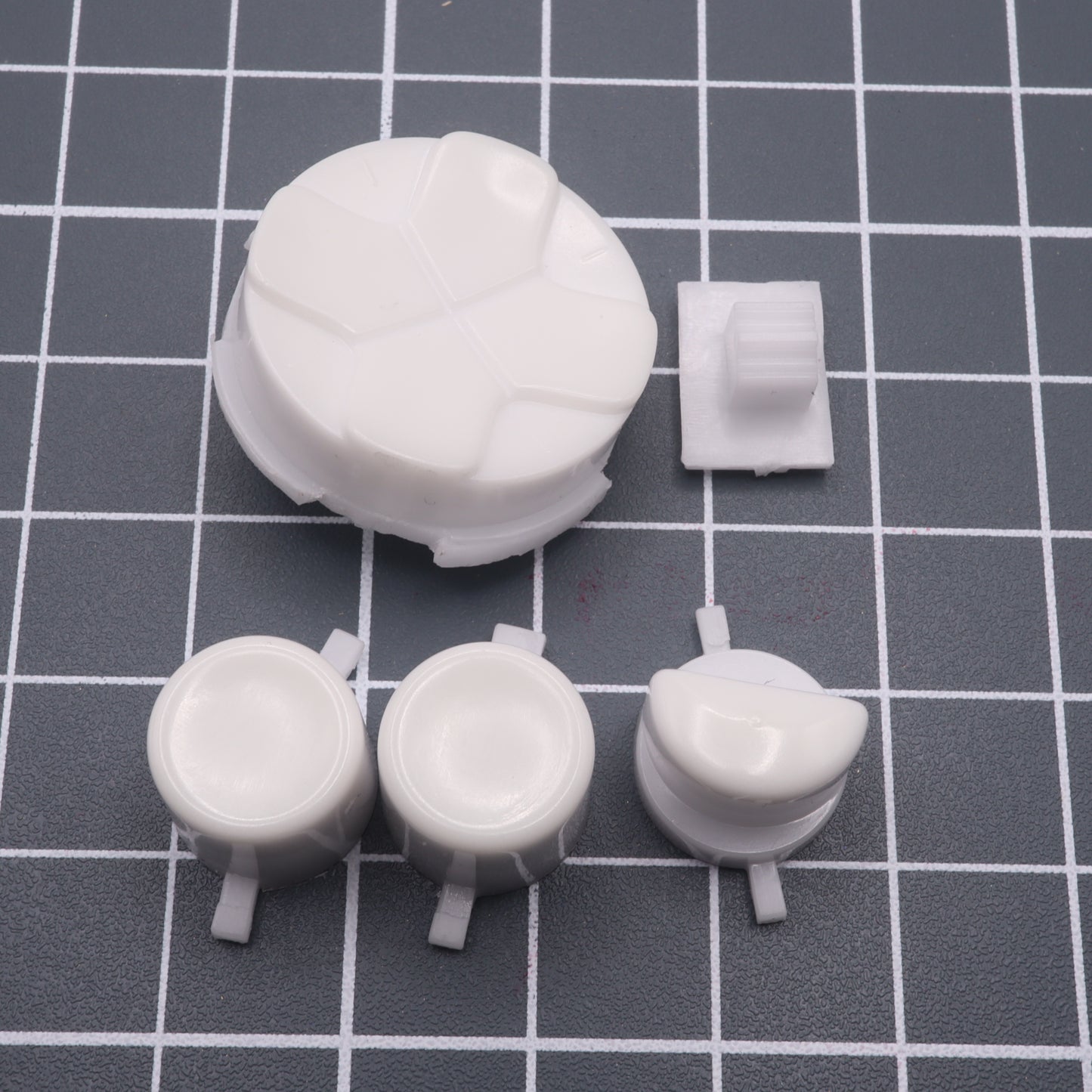 Hand cast custom resin buttons for Sega Game Gear - Glow in the dark Blue | Lab Fifteen Co