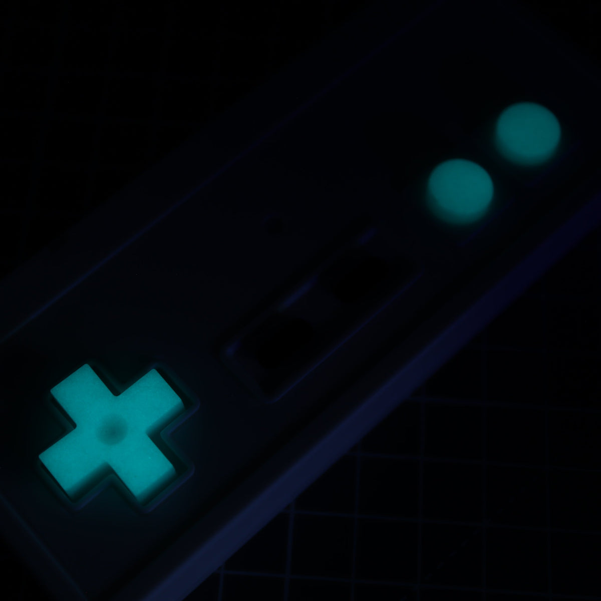 Hand cast custom resin buttons for Nintendo NES controller NES-004 (also fits Game Boy DMG-01) - Glow in the Dark Aqua | Lab Fifteen Co