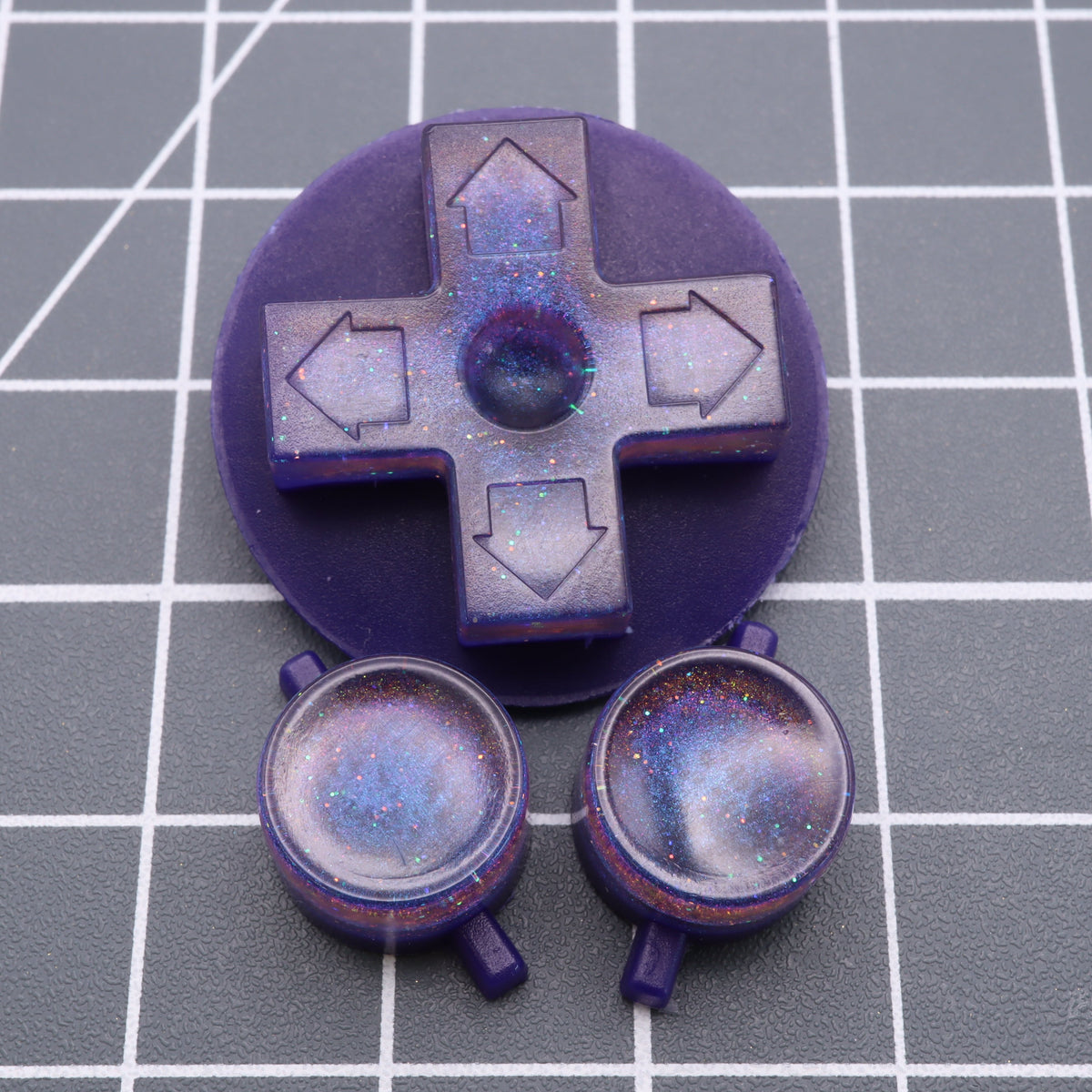 Hand cast custom resin buttons for Nintendo NES controller NES-004 (also fits Game Boy DMG-01) - Cosmic Purple | Lab Fifteen Co