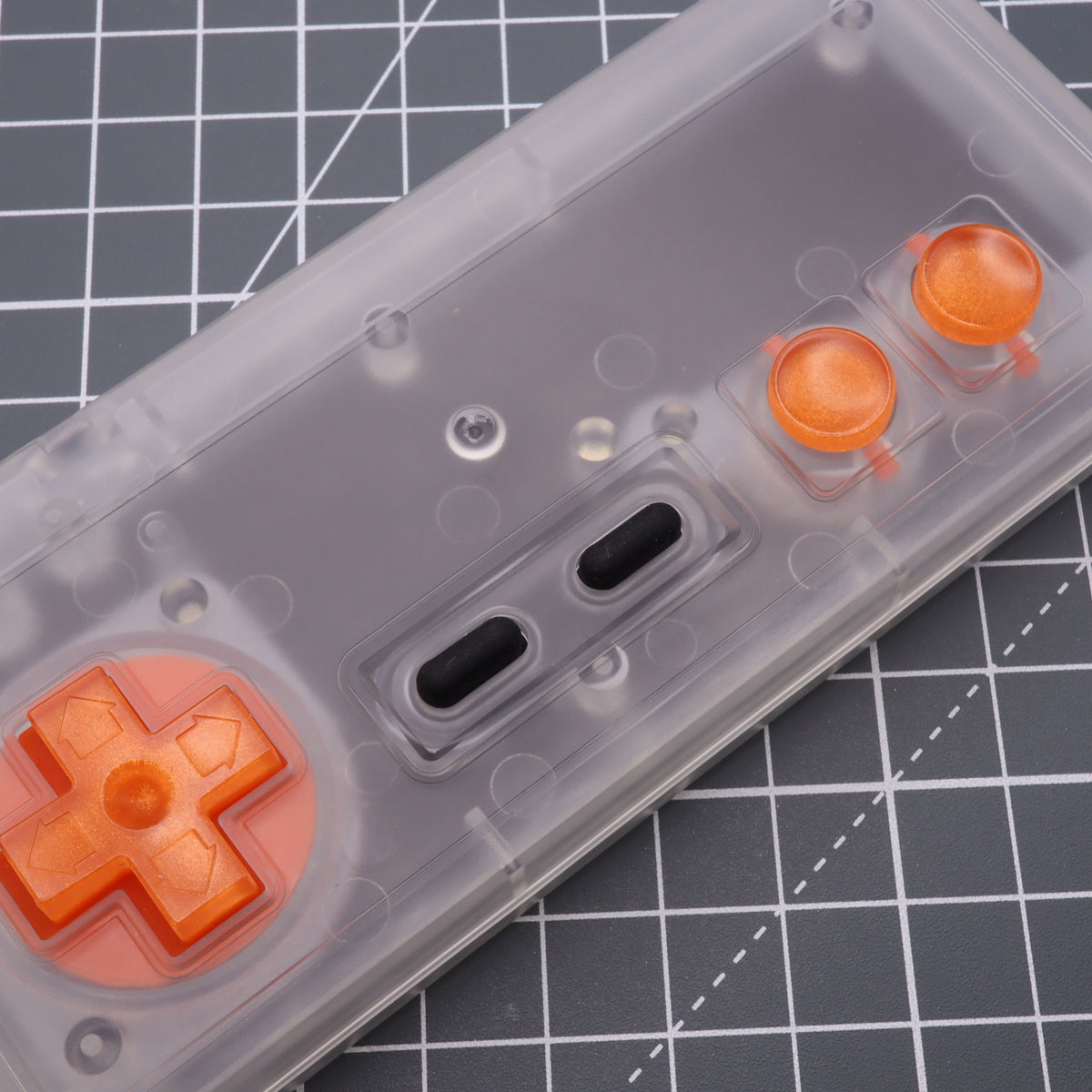 Hand cast custom resin buttons for Nintendo NES controller NES-004 (also fits Game Boy DMG-01) - Orange Candy | Lab Fifteen Co